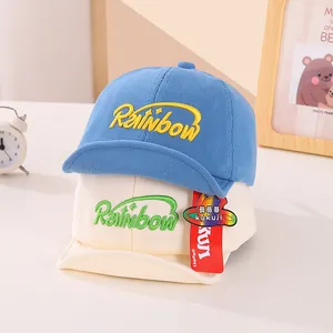 Toddler corduroy baseball caps with Rainbow embroidery in blue and beige colors