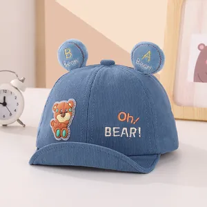 Blue corduroy baby baseball cap with cute bear ears and embroidered cartoon details