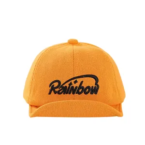 Bright orange knit baby baseball cap with Rainbow embroidery and a soft short brim