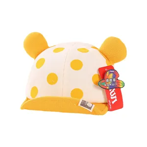 Cute polka dot baby baseball cap with yellow plush ears and soft cotton brim