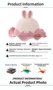 Detail of pink and beige corduroy baby bucket hat with cute rabbit ears and heart patch