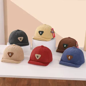 Collection of corduroy baby baseball caps with 'C' patches in six autumn colors