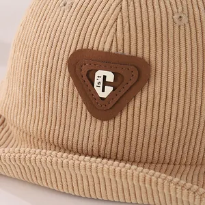 Khaki corduroy baby baseball cap with vintage 'C' letter patch and soft brim