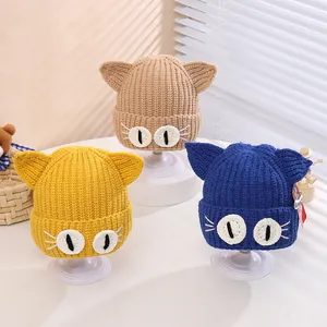 Winter knit baby hat with cute 3D cat ears and cartoon eye embroidery in three colors