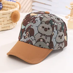 Close-up of kids' baseball cap with jacquard cartoon bear and rabbit pattern textures