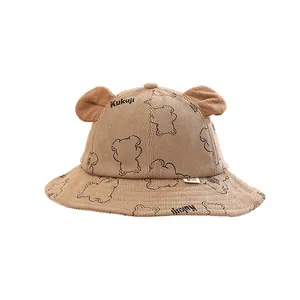 Cute brown corduroy baby fisherman hat featuring bear ears and cartoon bear print