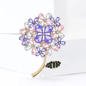 Elegant hydrangea flower brooch with pink and purple crystals on a gold-plated stem