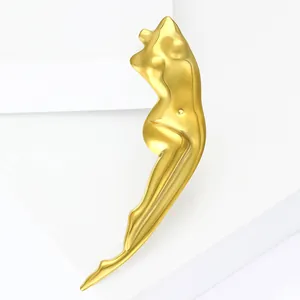 Minimalist gold stainless steel brooch with an abstract female body sculpture design