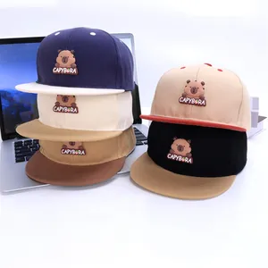 Close-up of kids capybara baseball hat with 3D silicone patch and color-block design