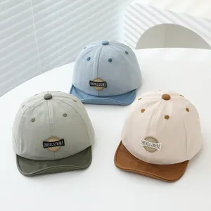 Three soft-brimmed cotton baby baseball caps with college embroidery for sun protection