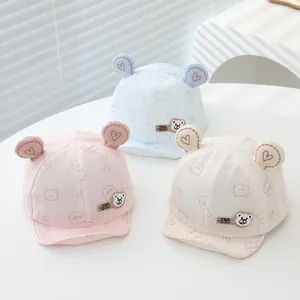 Cute baby soft brim baseball hats with bear ears in pink, blue, and cream colors