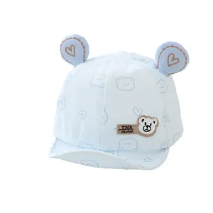 Light blue cotton baby baseball cap with cute bear ears and cartoon prints for spring