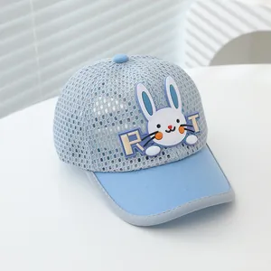 Close-up of a blue mesh sun hat for kids featuring a cute 3D bunny and letter embroidery