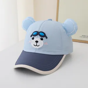 Detail of blue quick-dry kids baseball cap with bear ears and cartoon glasses design