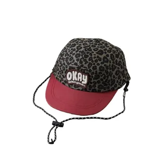 Adjustable leopard print kids baseball cap with red brim and OKAY letter patch