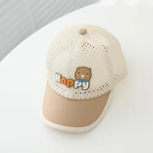 Detail of breathable mesh fabric and Happy bear embroidery on the toddler sun cap