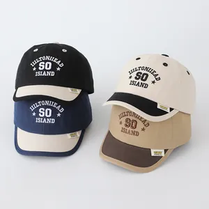 Kids cotton baseball caps with Boston embroidery available in four different colorways