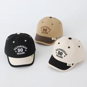 Detailed trio of kids' baseball caps showing assorted color blocks and embroidery