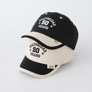 Detail of Boston baseball caps showing Hiltonhead embroidery and premium cotton canvas texture