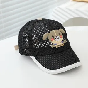 Detail of black breathable mesh kids baseball cap featuring a 3D cartoon dog patch