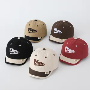 Collection of short brim baby baseball caps with Clape 3D embroidery in five colorways