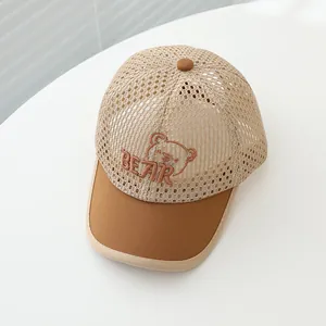 Close-up of khaki mesh kid's baseball cap with bear embroidery and breathable design