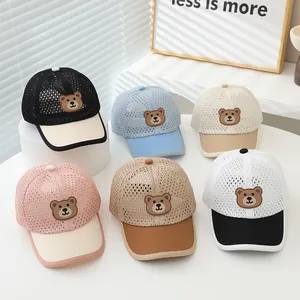 Detail view of breathable mesh kids' baseball caps with cute 3D bear patches in 6 colors