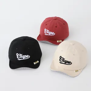 Retro short brim baby baseball caps in black, red and beige with Clape embroidery