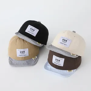 Set de cuatro gorras de béisbol para bebé de algodón con parche USN y visera suave a rayas