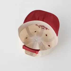 Detailed embroidery on inner crown and adjustable rear strap of cotton baby baseball cap