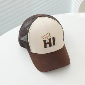 Kids baseball cap featuring brown mesh and white panels with bear and HI embroidery
