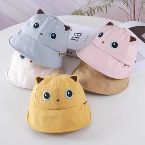 Detailed collection of kids cartoon cat fisherman hats in five pastel colors on display