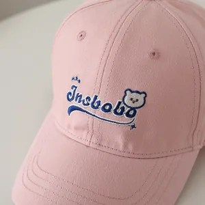 Pink cotton baseball cap with blue Insbobo embroidery and cute bear pattern for kids