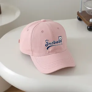 Detailed embroidery of cartoon bear and stars on pink cotton kids baseball cap
