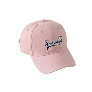 Pink cotton baseball cap for kids featuring blue Insbobo letter and bear embroidery