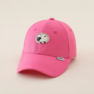Detailed view of pink kid baseball cap with sheep embroidery and breathable cotton fabric