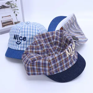 Baby soft brim baseball cap with Nice smiley face embroidery in striped and plaid patterns