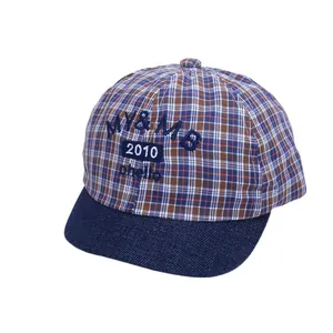 Blue and brown checkered baby baseball cap with soft brim and NICE smile embroidery