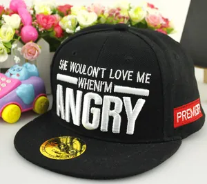 Close-up of ANGRY letter embroidery on a black snapback cap with a red side label