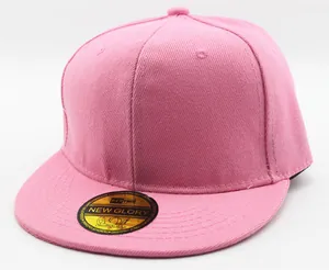 Close-up of pink cotton twill snapback baseball cap with gold brand sticker