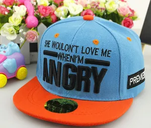 Detail of light blue flat brim cap with 3D embroidery and orange contrast visor