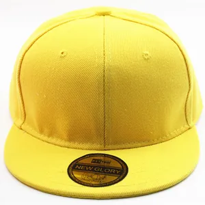 Bright yellow snapback baseball cap with six-panel design and flat brim on white background