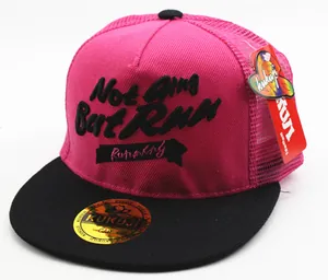 Close-up of pink mesh trucker hat with 3D embroidery and black brim for kids