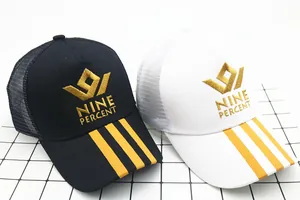 Detail of mesh baseball caps with gold Nine Percent embroidery and stripe accents