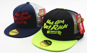 Detail of mesh trucker hats with 3D embroidery showing premium texture and stitching