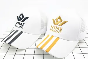 Detailed close-up of breathable mesh baseball caps with Nine Percent crown embroidery