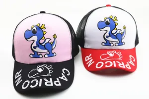 Detail of kids mesh baseball caps showing cartoon dinosaur prints and breathable fabric