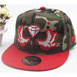 Camo snapback baseball cap with red brim and cartoon embroidery on a white background