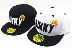 Detailed view of kids snapback caps featuring 3D LUCKY embroidery and crown design