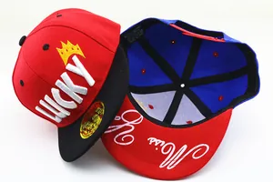 Detail of red kids snapback hat featuring LUCKY embroidery and adjustable back closure